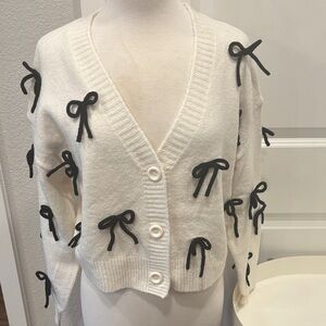 EUC Cream Cardigan with Black Bow Accents